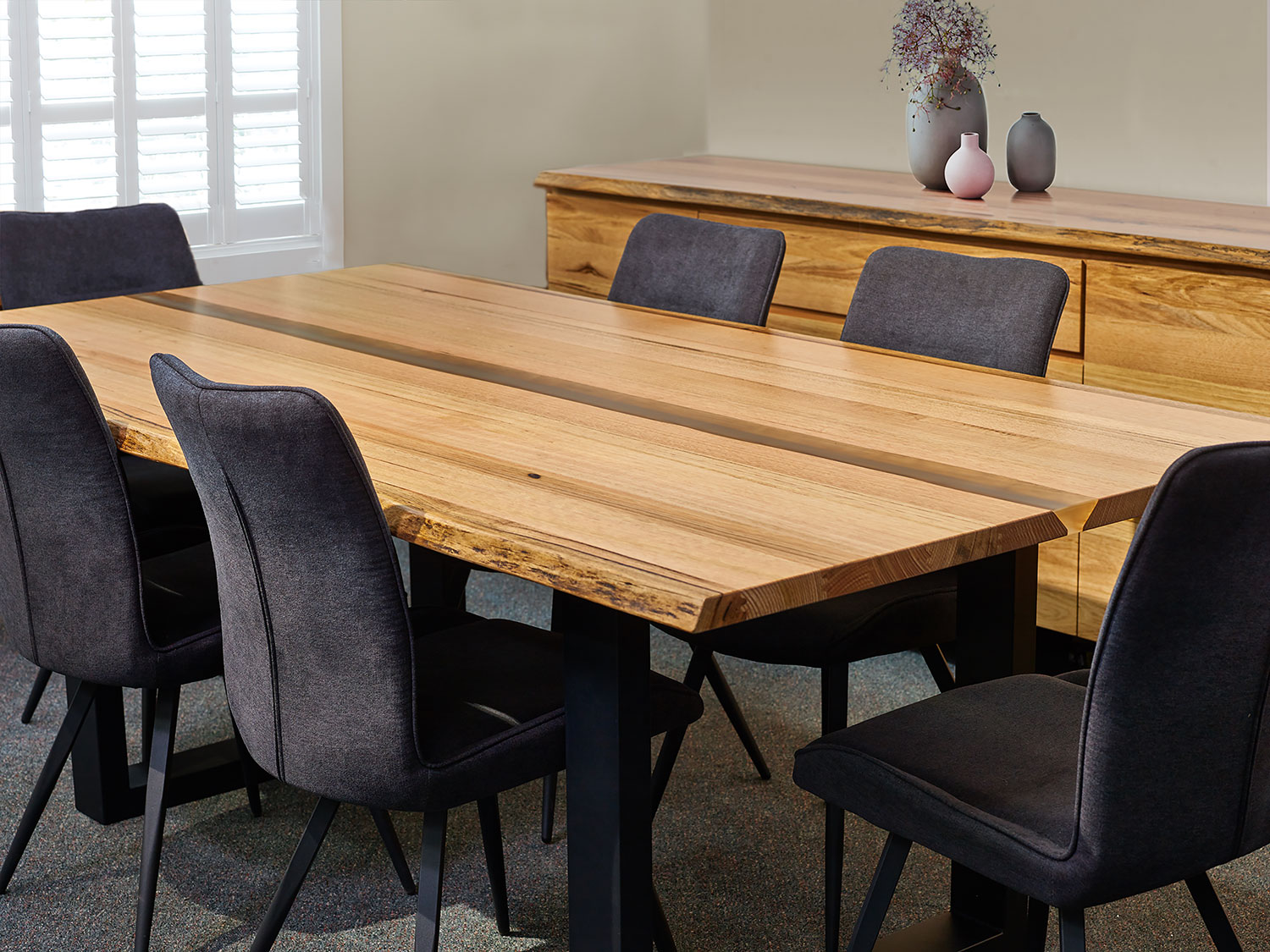 The Messmate Resin River dining table